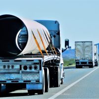 trucking-hauling-pipe-2022-08-01-01-23-33-utc